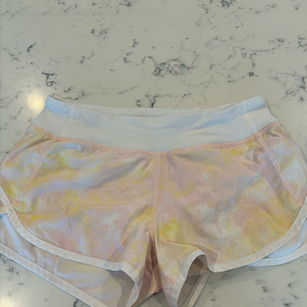 Ivivva pink, yellow, and white patterned kids shorts | size 12 |